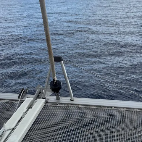 The catamaran deck on the open blue water